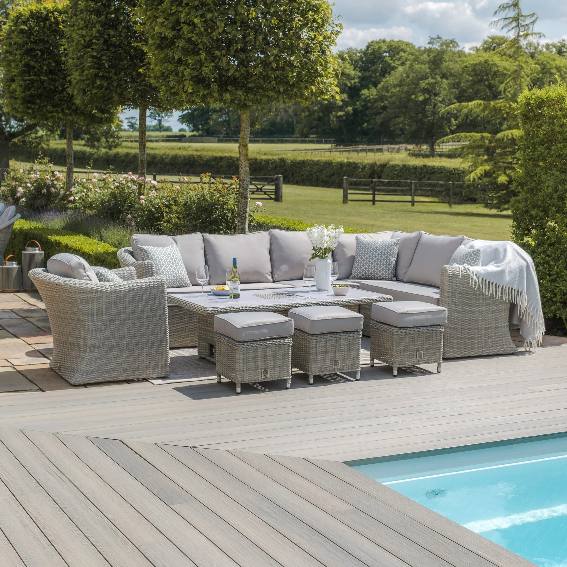 A Oxford Deluxe Large Rattan Corner Dining Set with Rising Table & Armchair - Ceramic Glass - Image 2