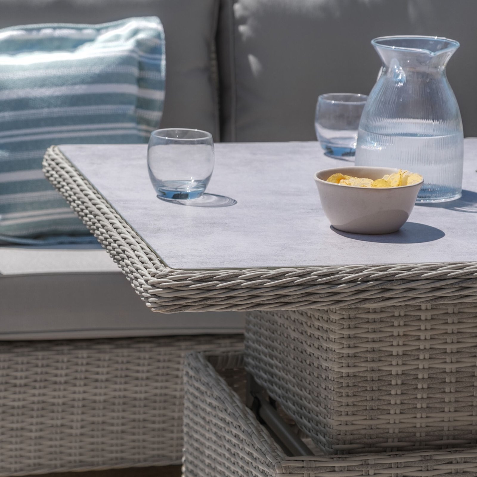 A Oxford Deluxe Large Rattan Corner Dining Set with Rising Table & Armchair - Ceramic Glass - Image 6