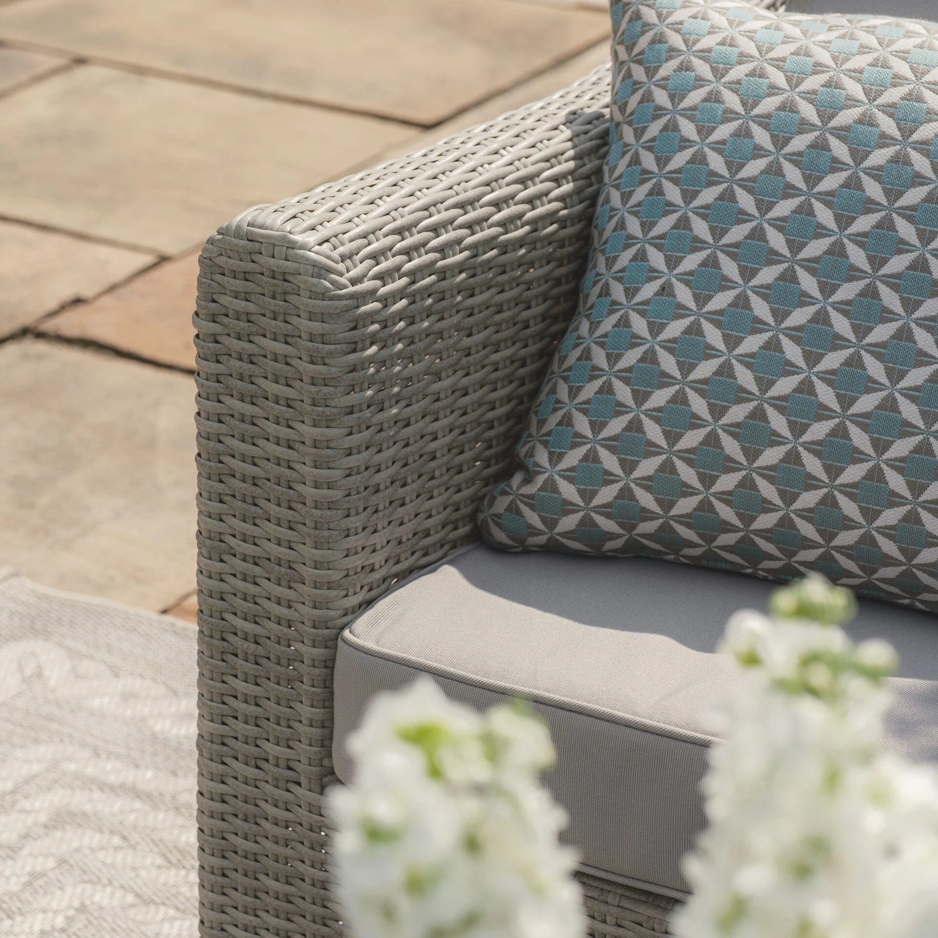 A Oxford Deluxe Large Rattan Corner Dining Set with Rising Table & Armchair - Ceramic Glass - Image 9