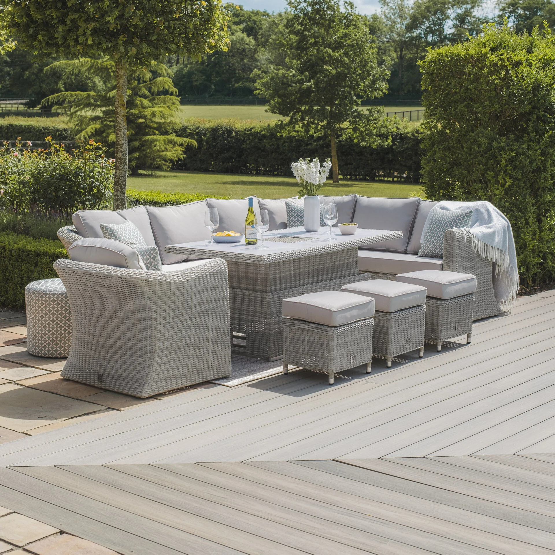 A Oxford Deluxe Large Rattan Corner Dining Set with Rising Table & Armchair - Ceramic Glass - Image 14